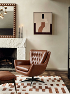Fauteuil pivotant en similicuir capitonné Cleveland par Greyson Living